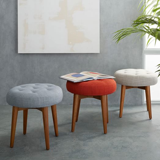 West Elm Mid-Century Upholstered Stools. On sale: $135-169!  Love the clean legs on this stool.